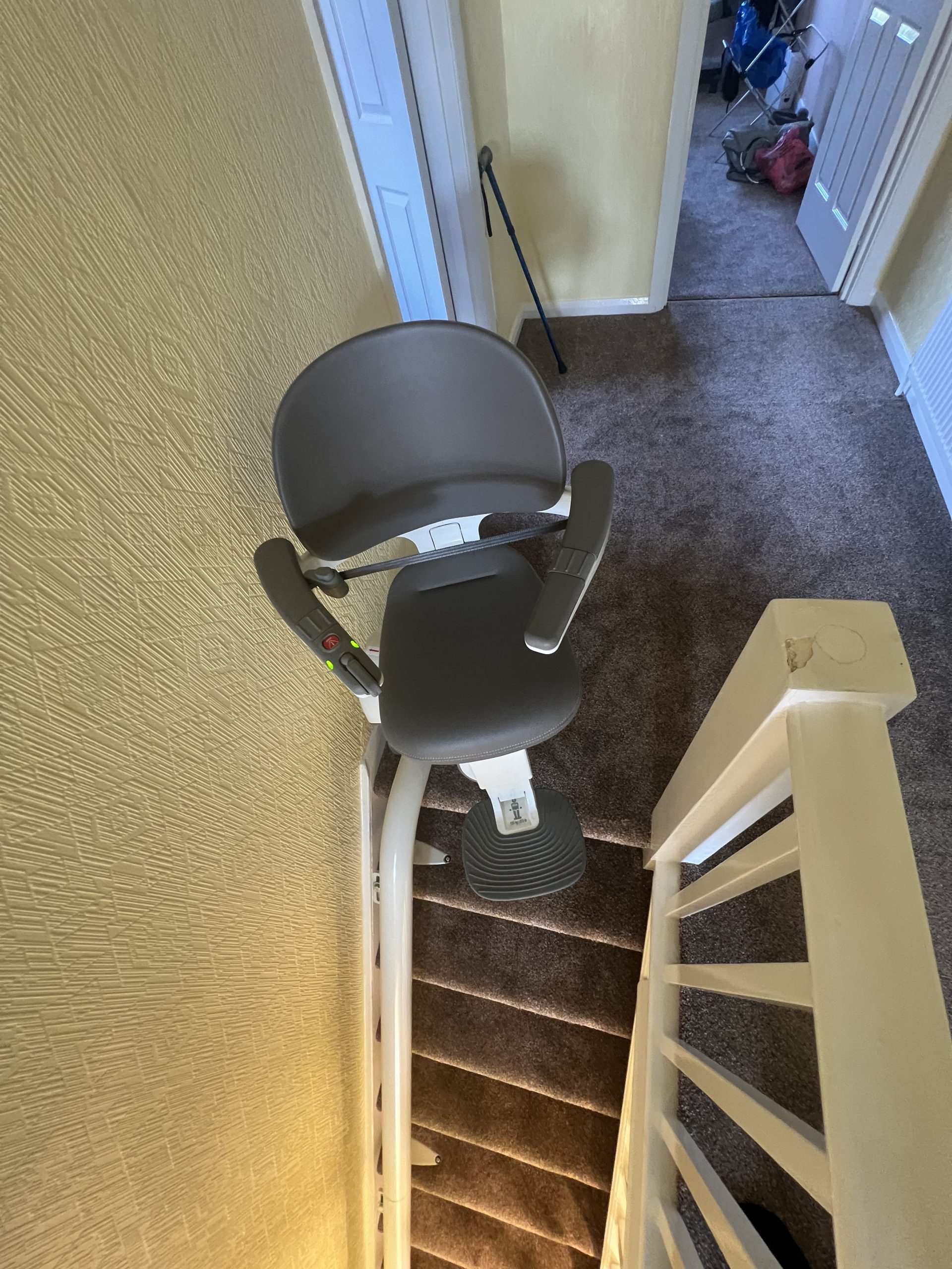 Flow X curved stairlift specialist example top finish on landing
