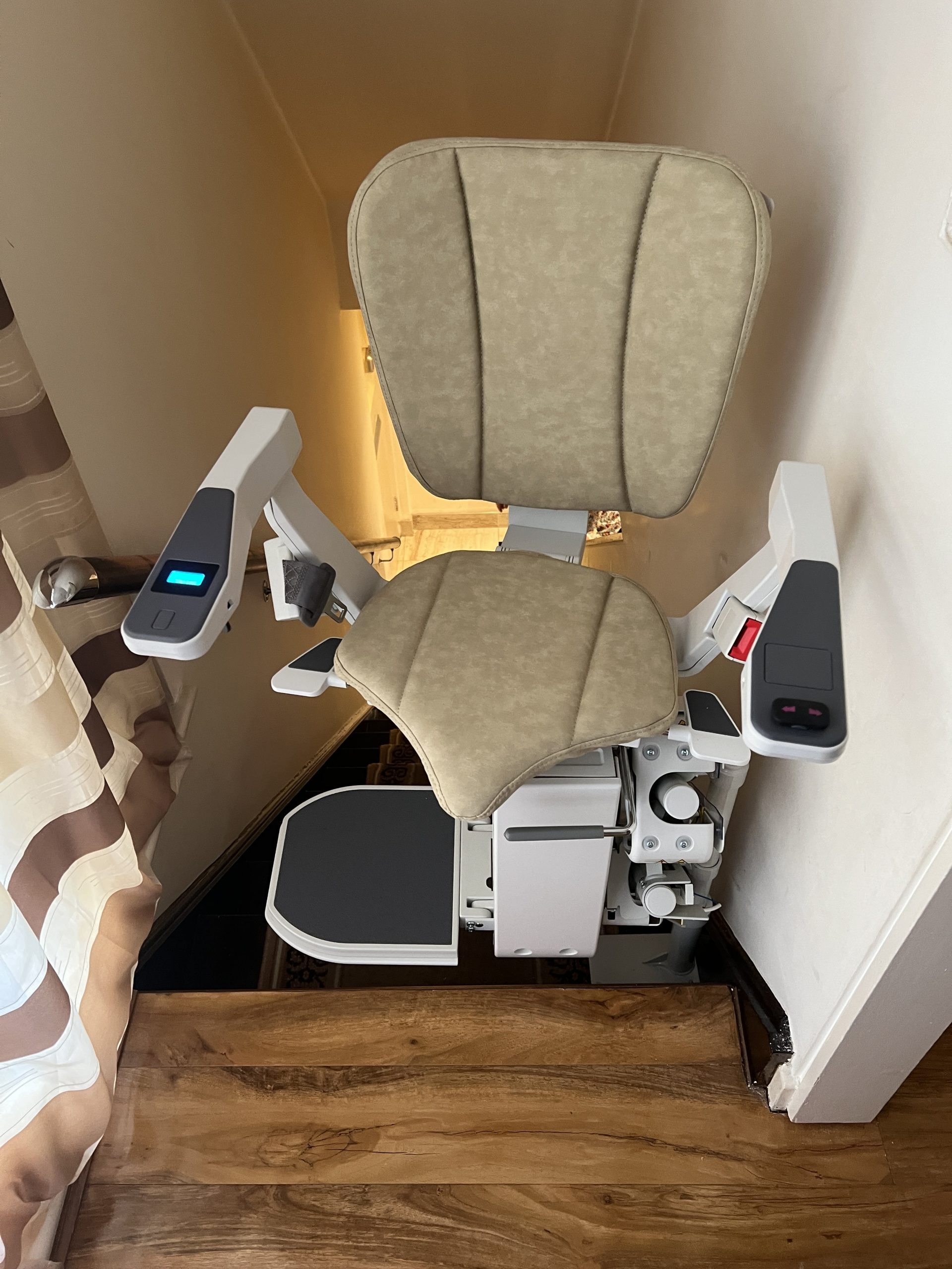 Platinum Ergo Curve curved stairlift heavy duty specialist example seat rotated at top of stairs Ergo seat pad