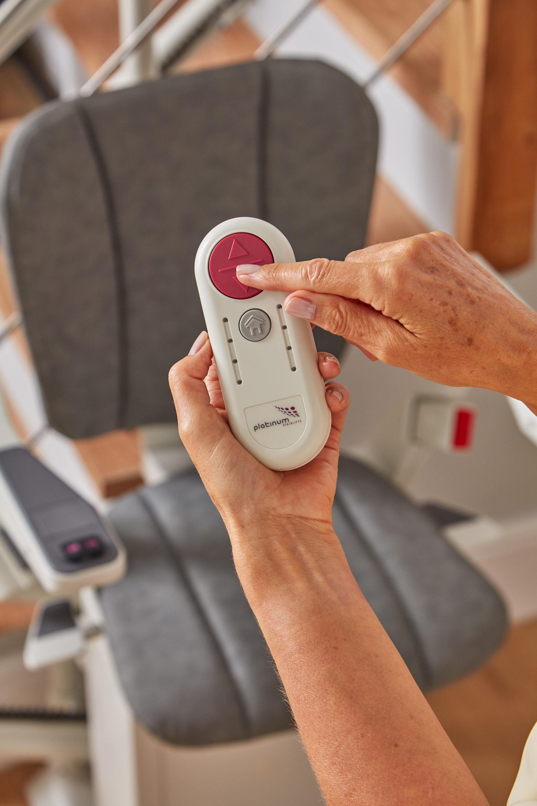 Platinum Ergo Curve curved stairlift remote control