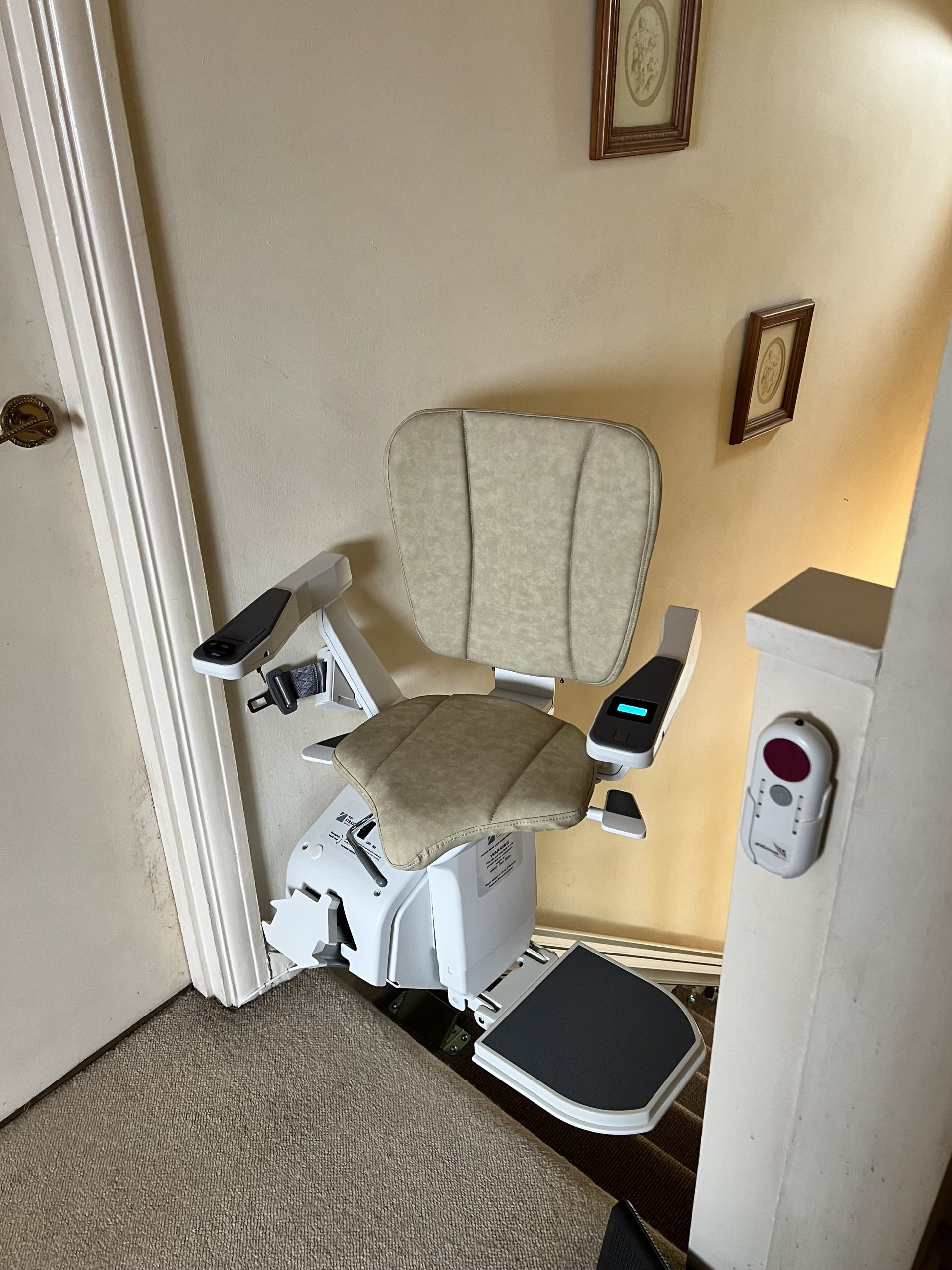 Platinum Ergo Straight straight stairlift specialist example power swivel rotated at top of stairs