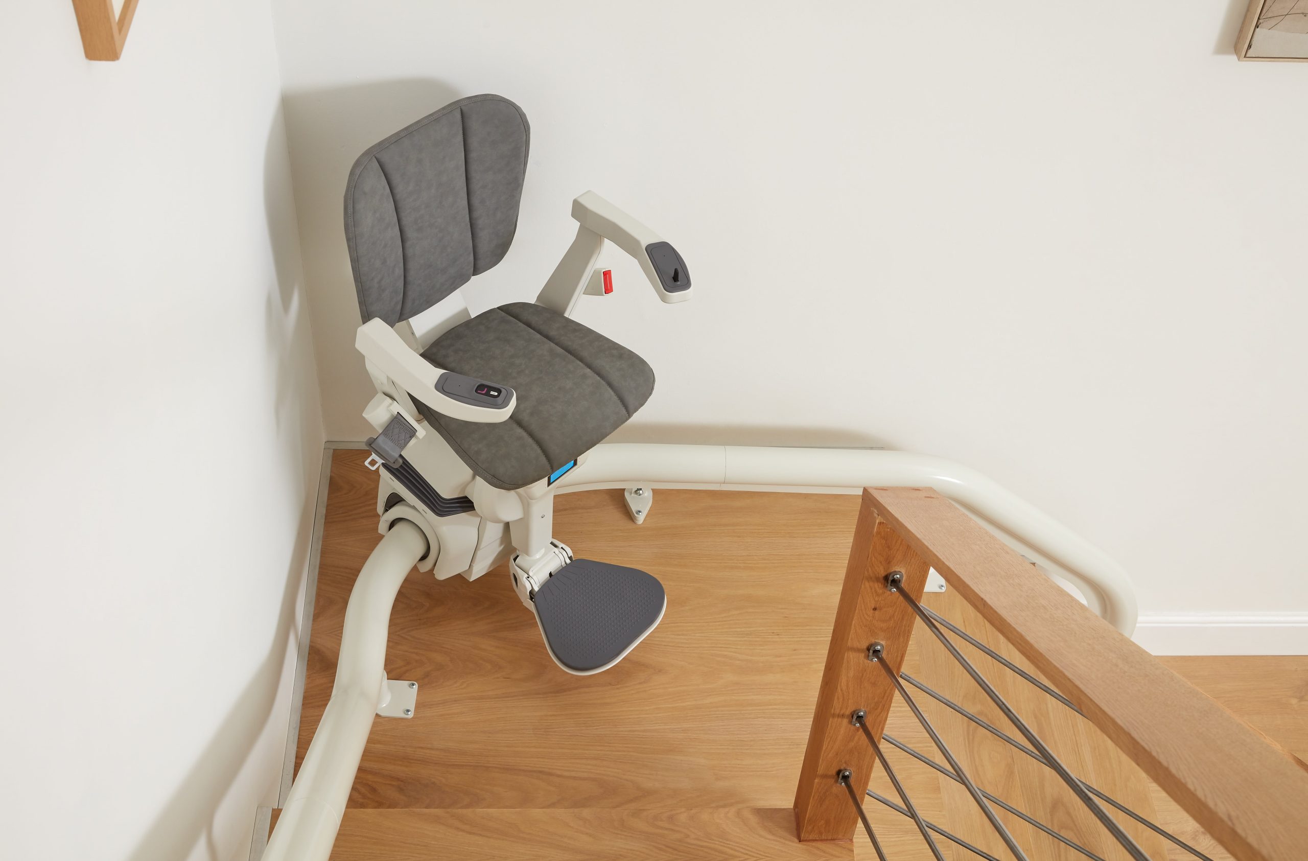 Platinum Ergo Ultimate curved stairlift top view travelling down the staircase
